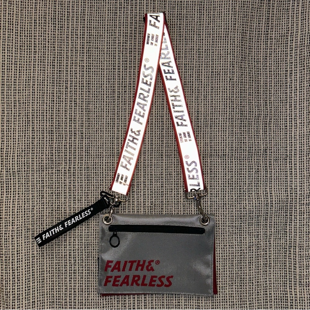 Faith and Fearless reflective strap reversible silver and red crossbody bag